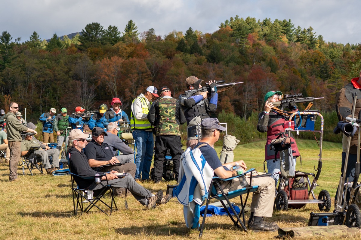 Competitors gathered on a rifle range, several wearing Black Coyote Sunshades