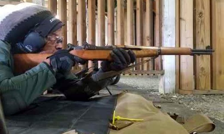 Black Coyote teammate Wayne firing a rifle from the prone position